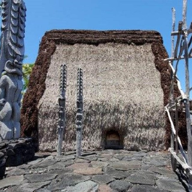 Hale o Keawe with accompanying Kiʻi decorated with ki leaves for the annual cultural festival.