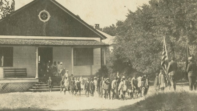Historic Photo of African Americans in front of School