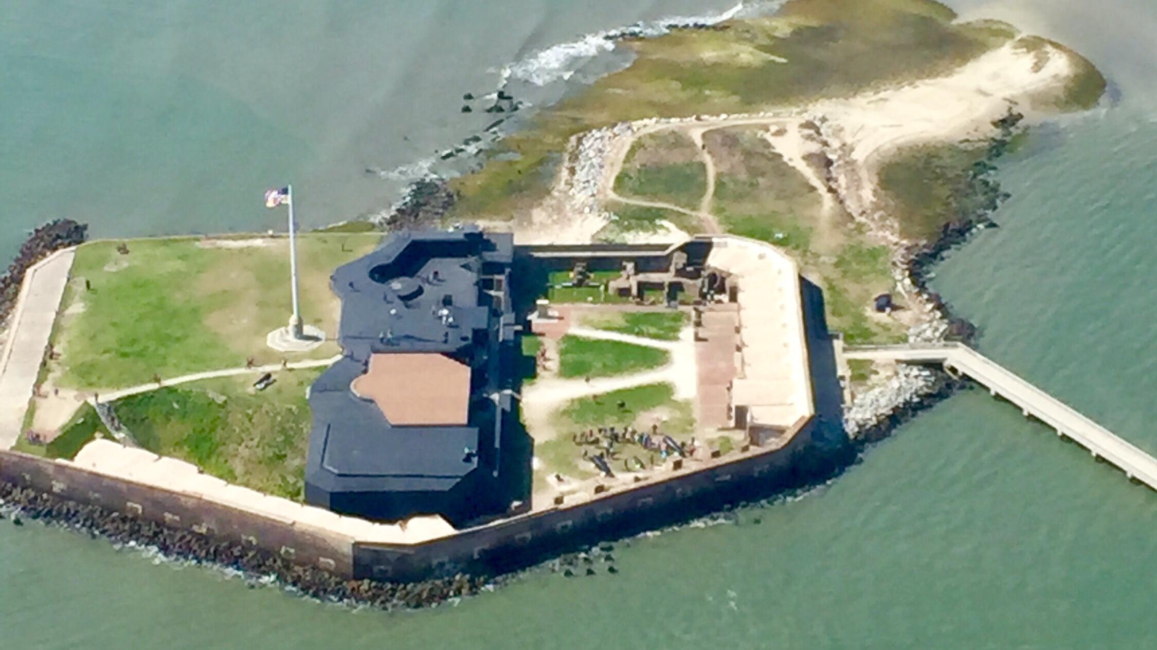 A pentagon fort on an island close to the mainland.
