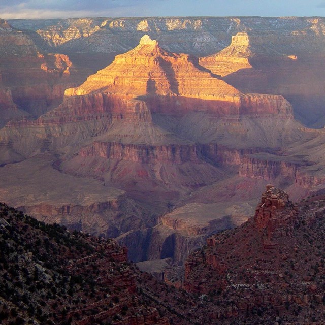 SUNSET IN GRAND CANYON AS SEEN FROM GRAND CANYON VILLAGE. GRAND CANYON N.P. NPS PHOTO.