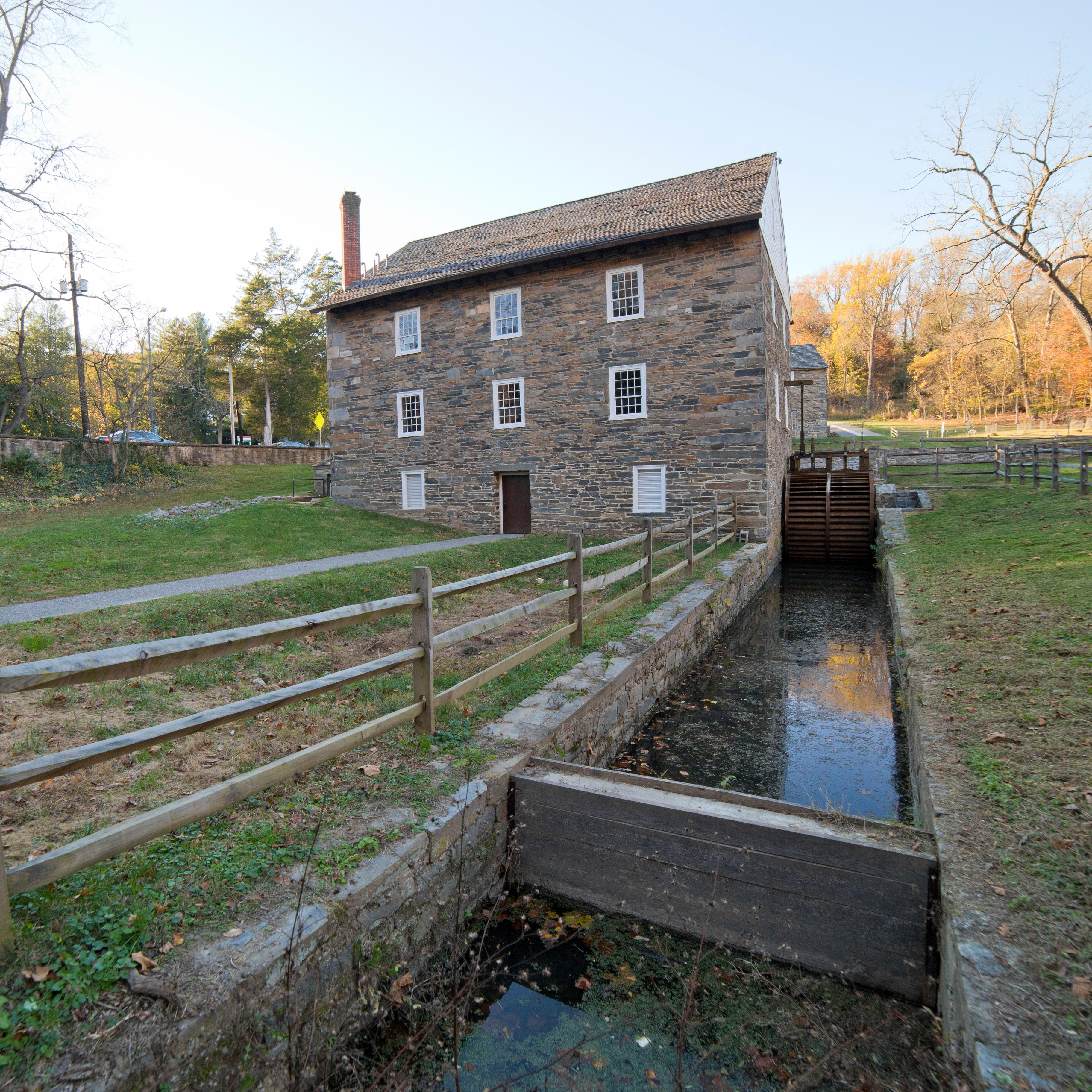 Peirce Mill from behind, the water wheel trough leads up to the building. 