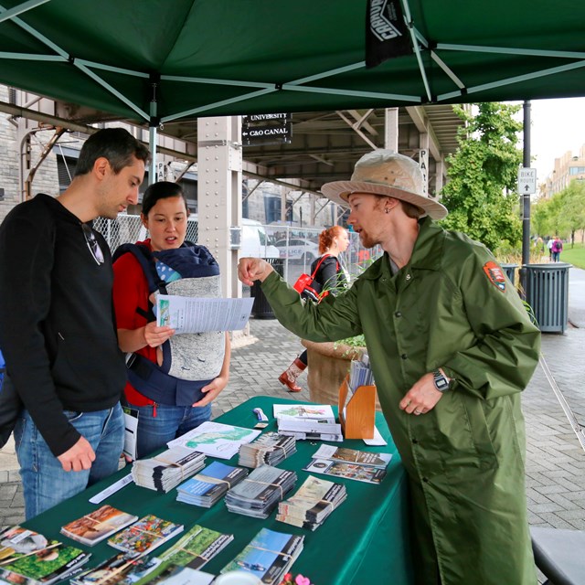 A ranger explains an aspect of the park to some visitors at Rock Creek Park Day 2016. 