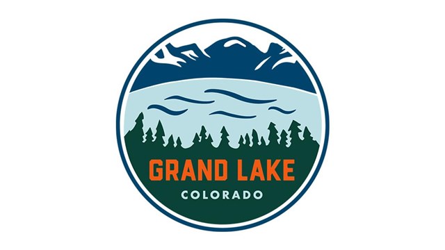 Town of Grand Lake logo with mountains, lakes, and trees. 