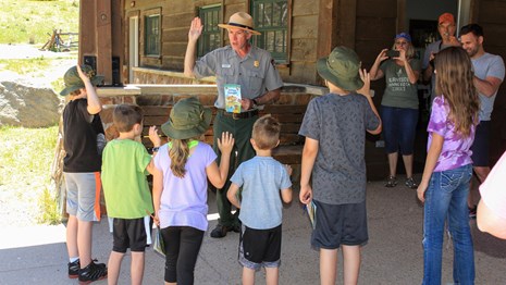 A group of Junior Rangers are being sworn in at Hidden Valley