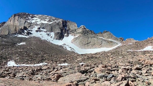 Snow on the north face of Longs Peak in June
