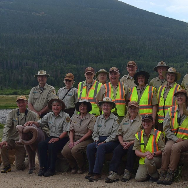 A group photo of the RMNP volunteer group the Bighorn Brigade is at Sheep Lakes