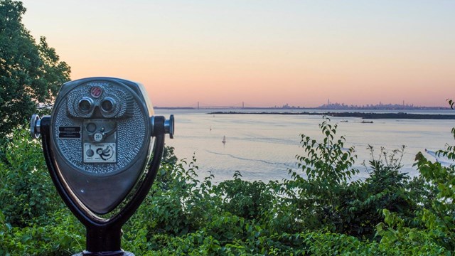 A sunset over a city skyline