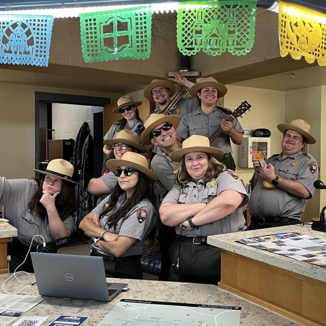 Park Ranger demonstrates the atl atl for a visiting field trip.
