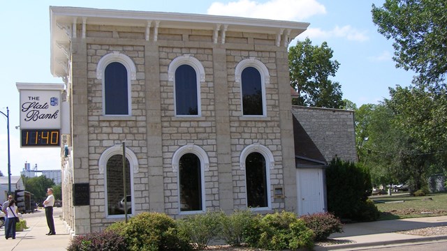 A stone, two-story brick building from the 1800s.