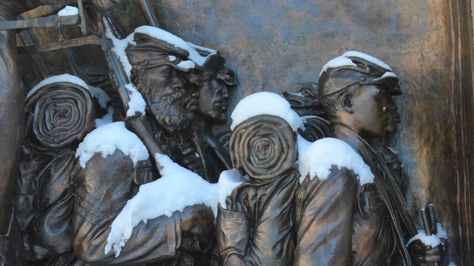 54th Shaw Memorial sculpture close-up of soldiers and a dusting of snow