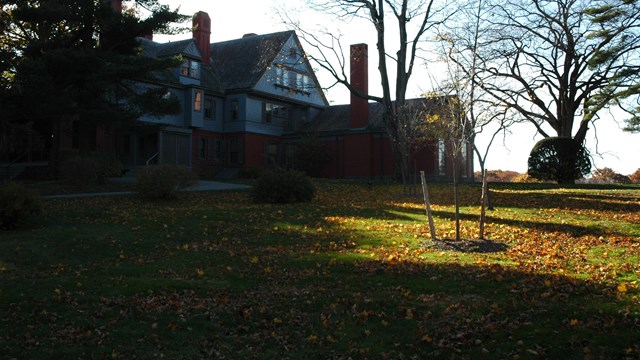 The Roosevelt home exterior, dark and light contrast from the sun