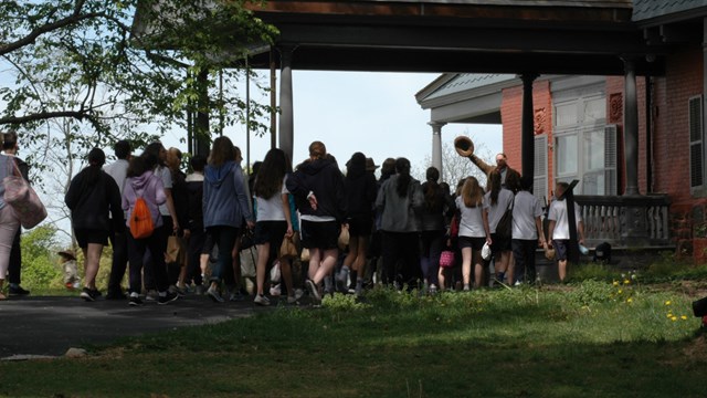 Students outside the Theodore Roosevelt home