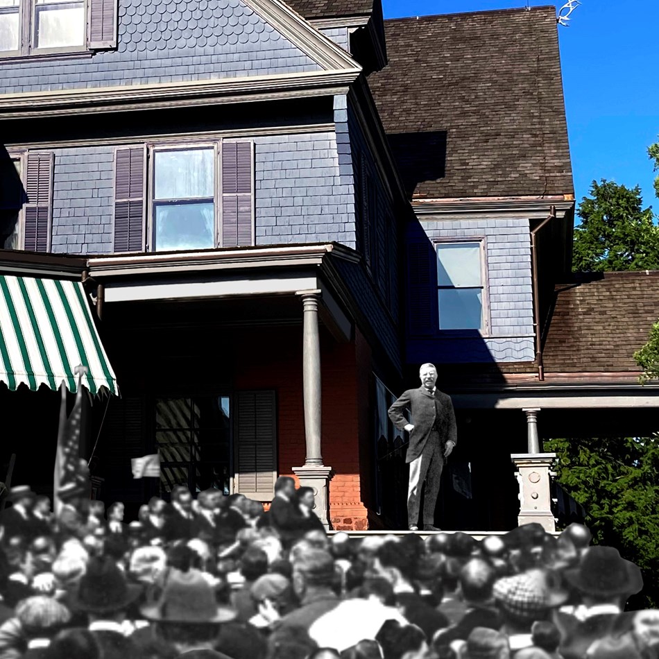 Theodore Roosevelt on his porch with a crowd below.