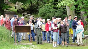 Park ranger leading a hike with visitors.
