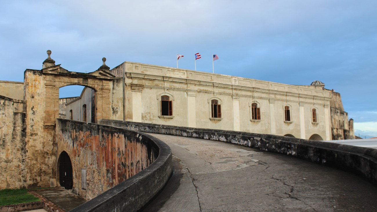Steep ramp leads to historic entrance to Castillo San Cristóbal.
