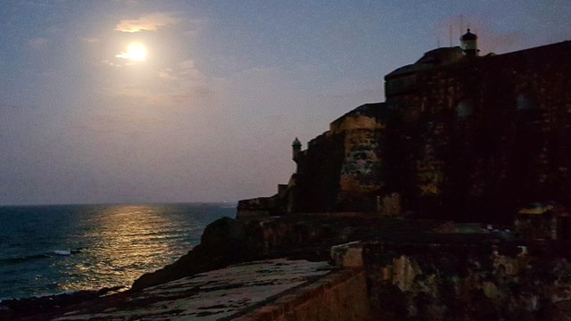 Moon reflecting in the Atlantic, with El Morro Fortification in the foreground