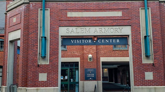 Brick structure with the name of the visitor center