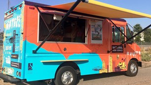 Bright colored food truck.