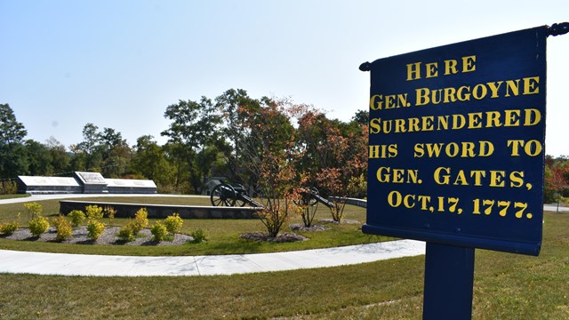 Sign in foreground reads Here Gen Burgoyne surrendered his sword to Gen Gates Oct 17, 1777 