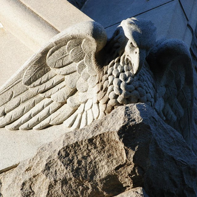 Detail of eagle carved into stone