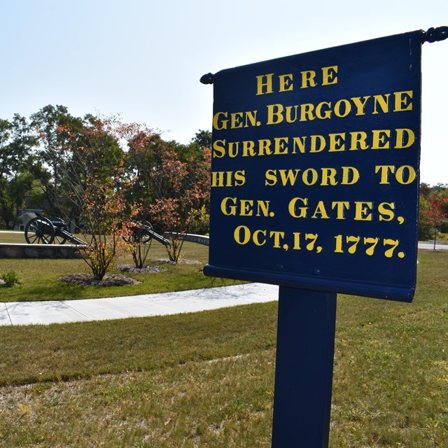 Sign in foreground reads Here Gen Burgoyne surrendered his sword to Gen Gates Oct 17, 1777 