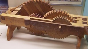 A piece of wooden machinery. 