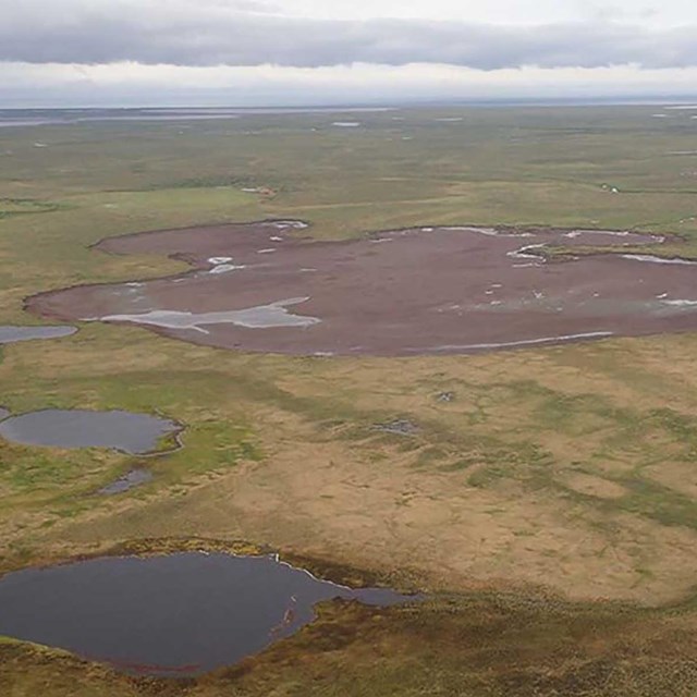 A dry lake bed in the Arctic tundra.