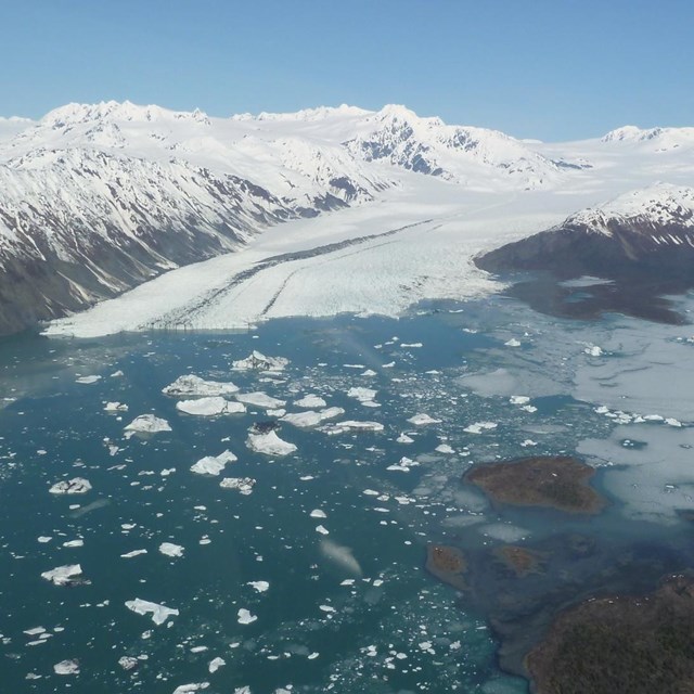 An aerial view of a tidewater glacier.
