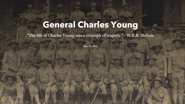 Text reads "General Charles Young" over a historic photo of mostly Black men in military uniform