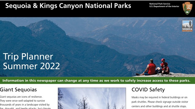 The front page of a newspaper for summer 2022 features three hikers in red shirts sitting on rocks.