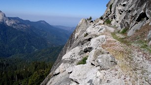 The High Sierra Trail winds along a granite cliff