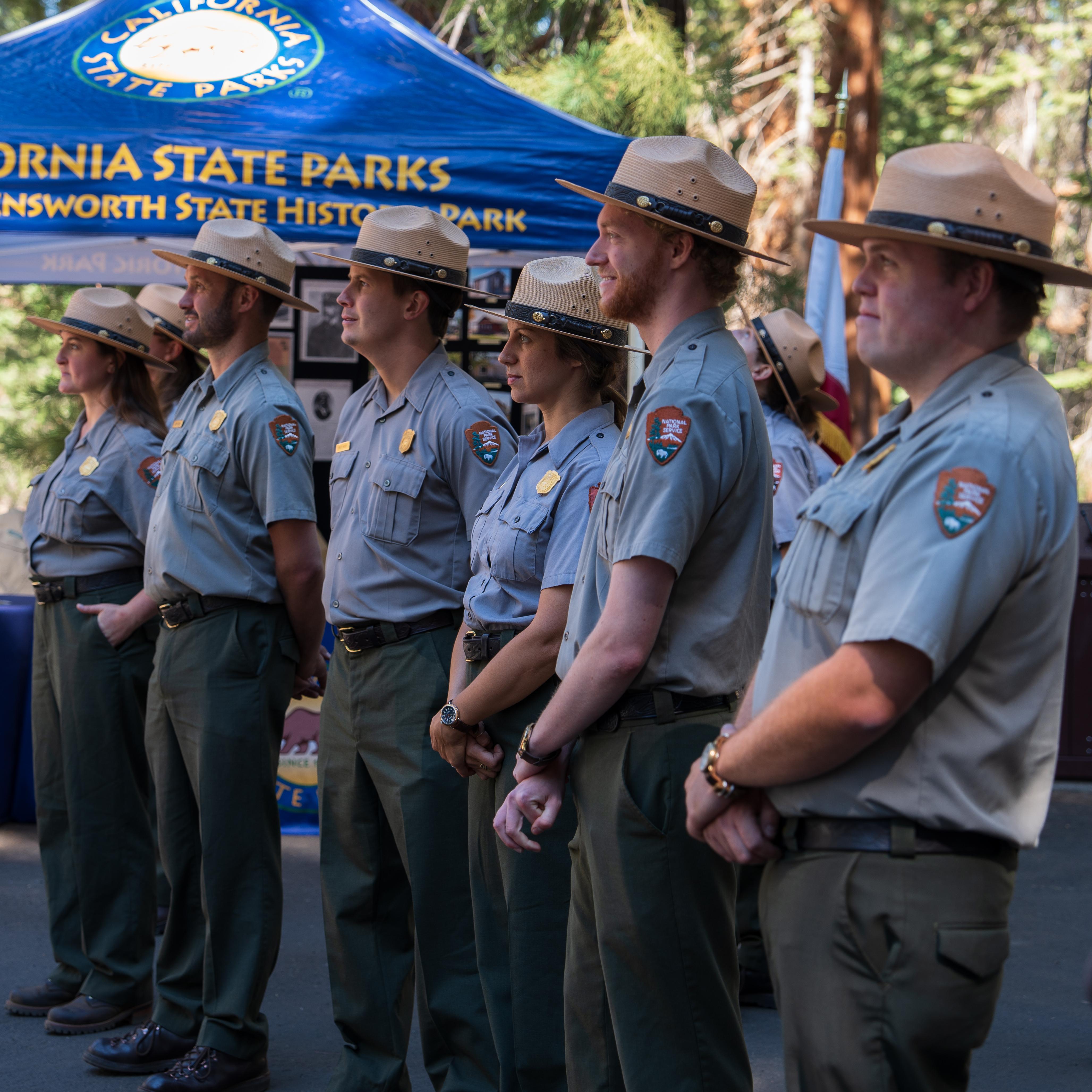 A group of rangers stand at attention during a ceremony.