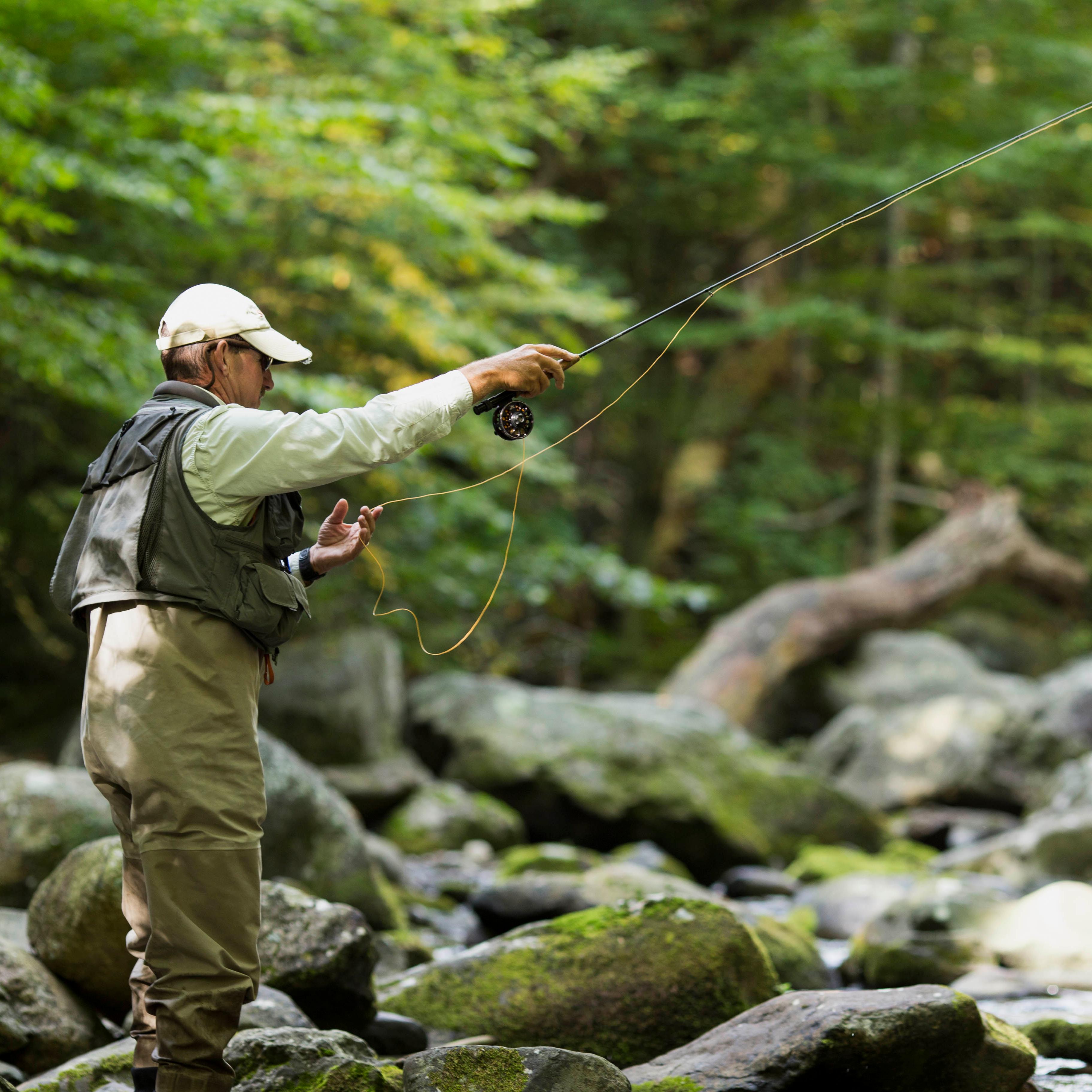 Man flyfishing in a stream 