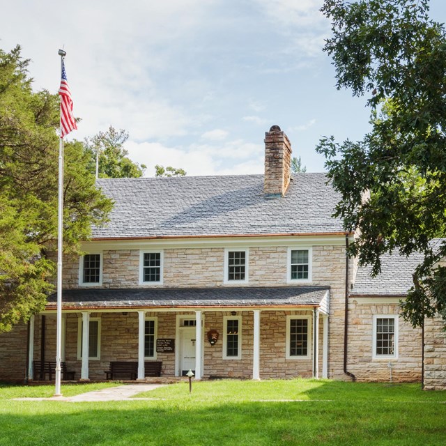 An historic stone building; the Park headquarters.
