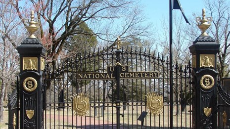 Black wrought iron gates of the national cemetery