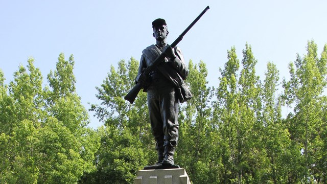 Bronze soldier holding a musket