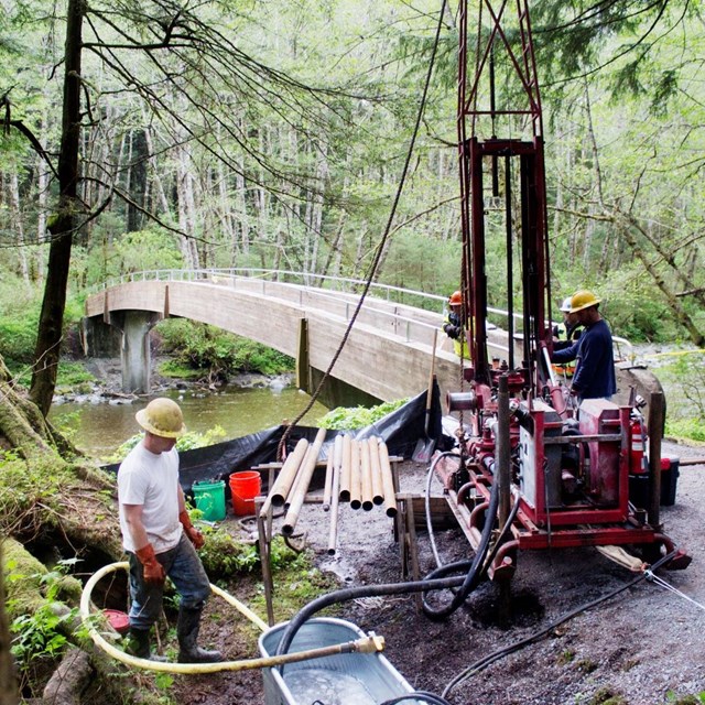 Maintenance workers working on park trails