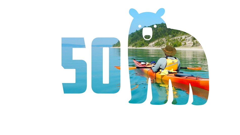  Bear outline with photo of kayaker inside