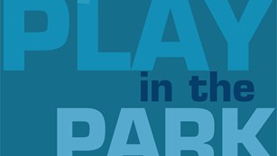 Blue box with the words, 'play in the park'