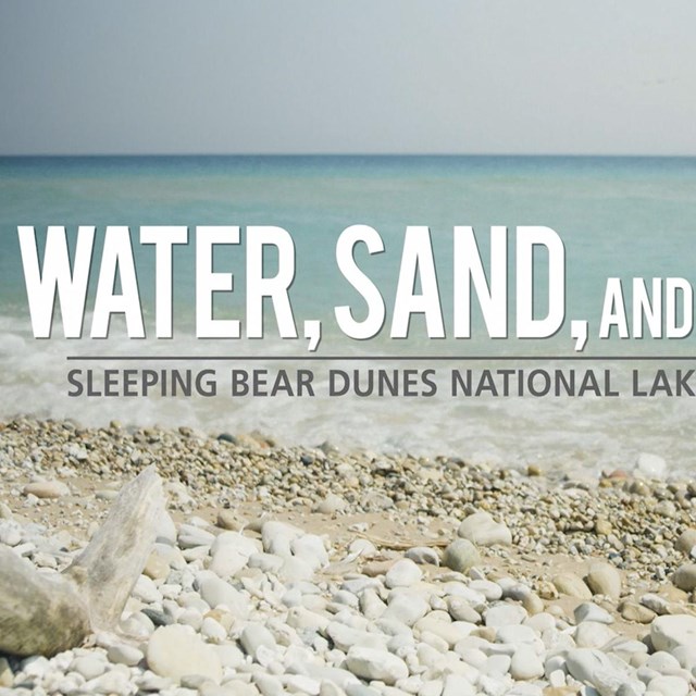  Image of a rocky Lake Michigan beach at Sleeping Bear Dunes National Lakeshore under a cloudy sky w
