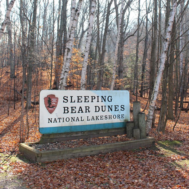 A welcome entrance sign with the text, 