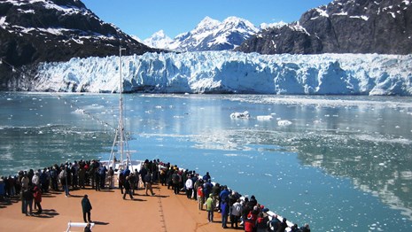 Visitors enjoy a boat tour in Glacier Bay National Park