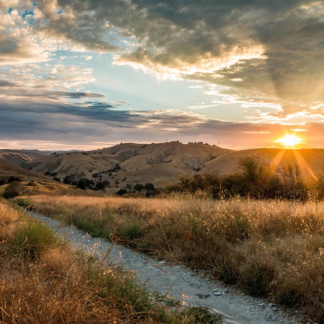 The sun rises over Cheeseboro Canyon in Santa Monica Mountains National Recreation Area