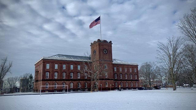 The Main Arsenal on a winter day with snow covering the grounds. 