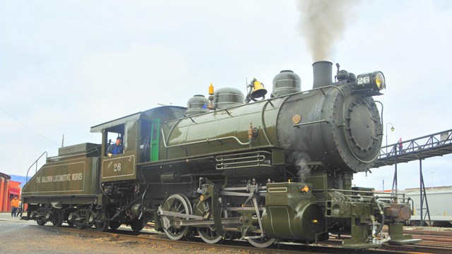 Baldwin 0-6-0 steam locomotive in green paint
