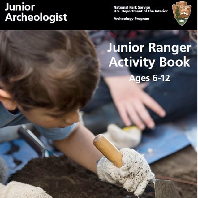 Image of the cover of the Junior Archeologist activity. Shows child with gloves and trowel in dirt