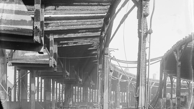 (Charred D.L. & W. roundhouse interior after fire)