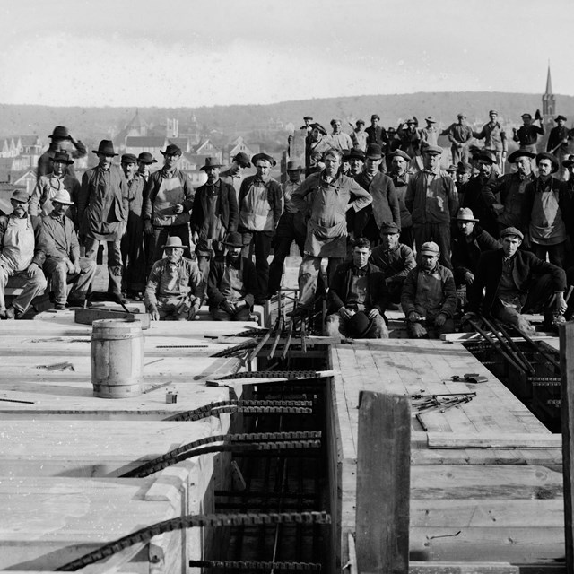 Construction workers, locomotive shop