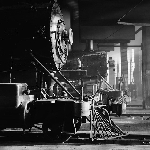 Locomotives awaiting servicing in roundhouse
