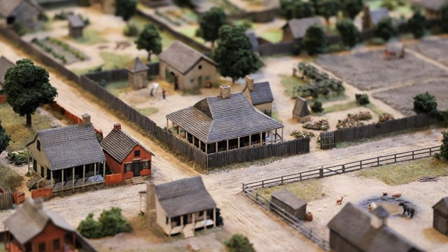 Areal view of a model of French colonial houses along a street. 